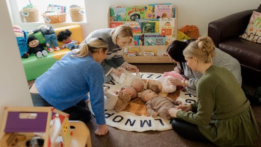 Photo: North East Lincolnshire Council|Ann-Marie, DCS North East Lincolnshire Council|North East Lincolnshire's Immingham Family Hub
|Young therapist woman speaking and treating child, counselor and behaviour correction at pedagogue payroom taking notes on clipboard