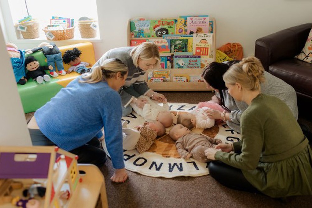 Photo: North East Lincolnshire Council|Ann-Marie, DCS North East Lincolnshire Council|North East Lincolnshire's Immingham Family Hub
|Young therapist woman speaking and treating child, counselor and behaviour correction at pedagogue payroom taking notes on clipboard
